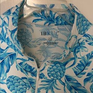 IBKUL Turquoise Blue and White Tropical Sun Protection Quarter Zip shirt